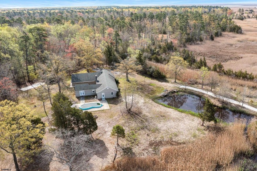 First watch the virtual tour and then imagine yourself living on - Beach Home for sale in Egg Harbor Township, New Jersey on Beachhouse.com