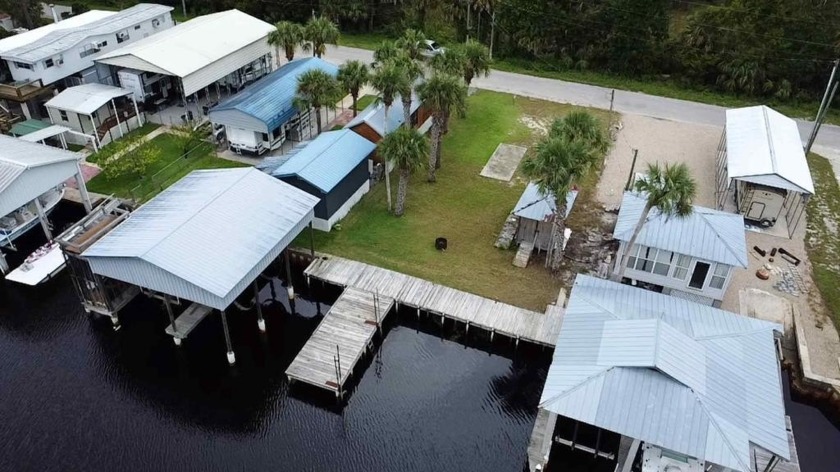 WATERFRONT LOT FOR SALE - Nice clean lot with a dock that faces - Beach Lot for sale in Suwannee, Florida on Beachhouse.com