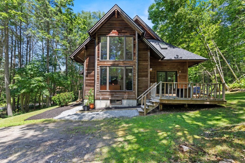 This sun drenched home rests in a clearing among thick pines - Beach Home for sale in West Bath, Maine on Beachhouse.com