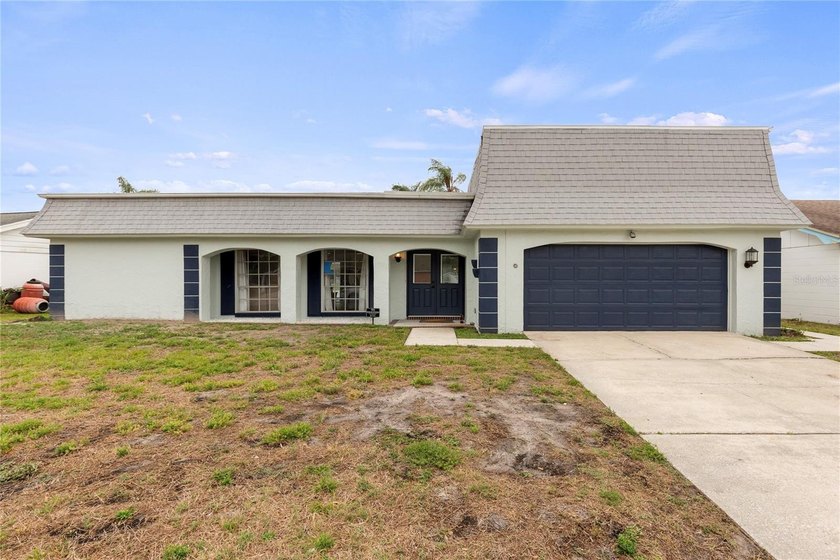 Lovely setting on a spring-fed lake. Enjoy the spectacular - Beach Home for sale in Holiday, Florida on Beachhouse.com