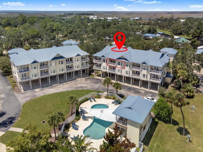 Experience coastal living at its finest with this inviting - Beach Condo for sale in Suwannee, Florida on Beachhouse.com