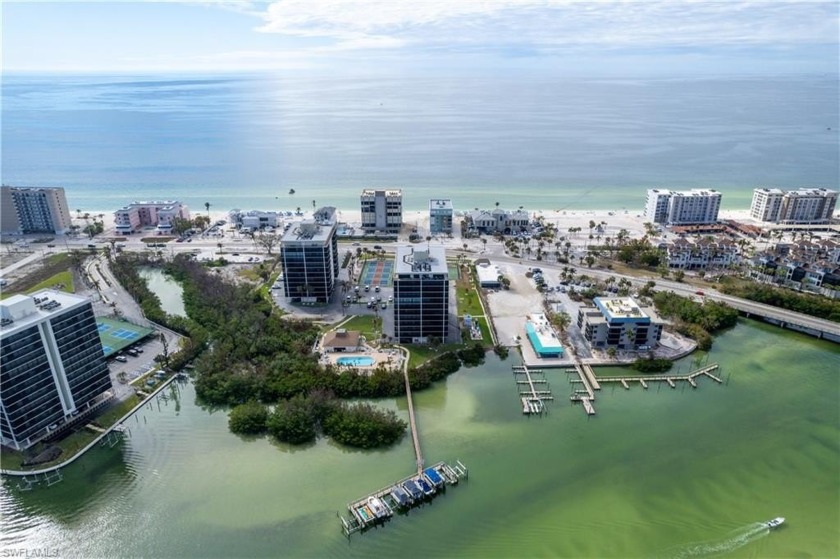 YOUR PIECE OF PARADISE AWAITS...WELCOME TO SEA ISLES 7D WITH - Beach Home for sale in Bonita Springs, Florida on Beachhouse.com