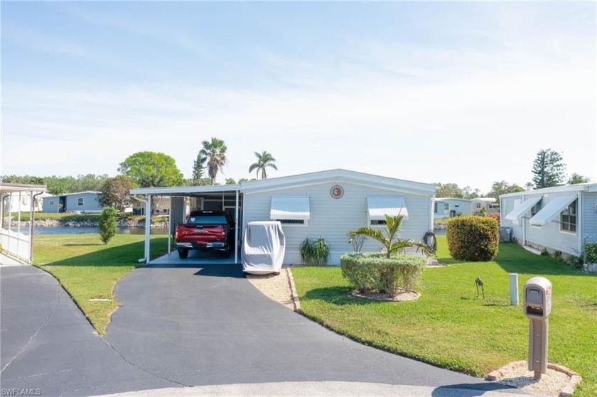 Beautifully Updated Lakefront Home in Naples - Just 7 Miles to - Beach Home for sale in Naples, Florida on Beachhouse.com