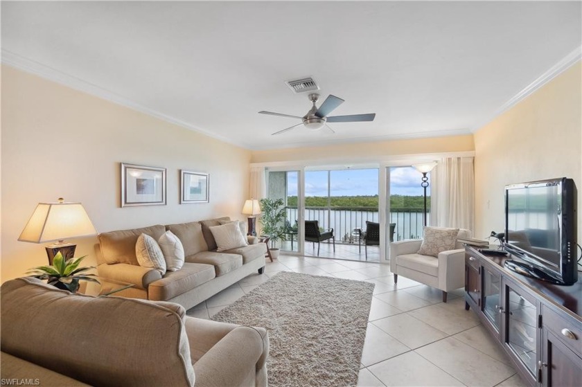 Discover the epitome of waterfront living in this beautiful - Beach Condo for sale in Naples, Florida on Beachhouse.com