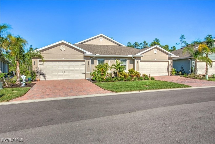 This coastal contemporary home with private preserve view will - Beach Home for sale in North Fort Myers, Florida on Beachhouse.com