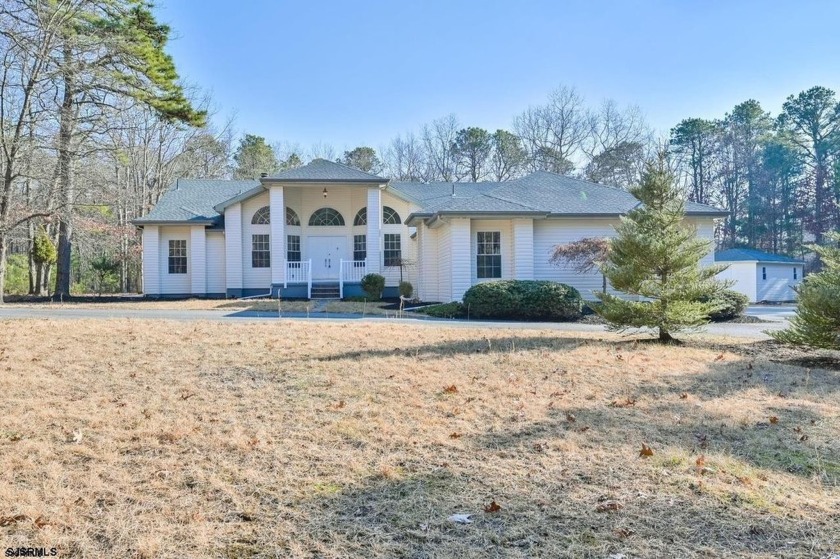 Welcome to your private retreat! Nestled on a serene and - Beach Home for sale in Galloway, New Jersey on Beachhouse.com