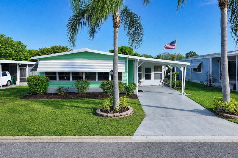 Live the vacation every single day in vibrant Barefoot Bay! This - Beach Home for sale in Sebastian, Florida on Beachhouse.com