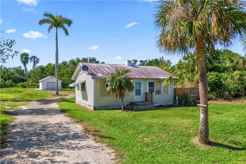 This charming 1BR/1BA home sits on a 1/2-acre PLUS lot with a - Beach Home for sale in North Fort Myers, Florida on Beachhouse.com