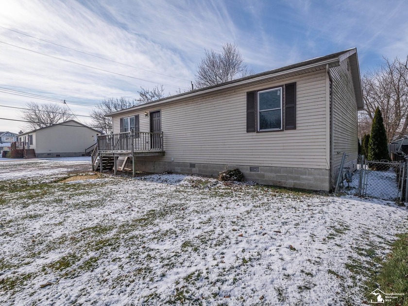 Welcome to this 3-bedroom, 2-bath single-family home nestled in - Beach Home for sale in Newport, Michigan on Beachhouse.com