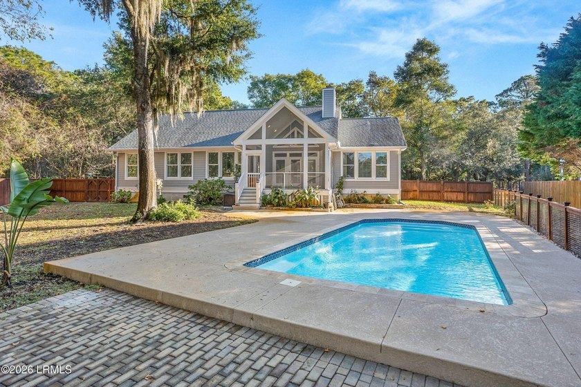 This beautifully designed home features a welcoming front porch - Beach Home for sale in Beaufort, South Carolina on Beachhouse.com