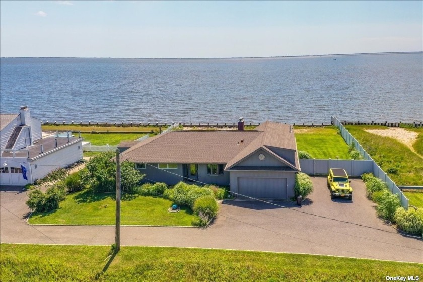 One of a kind, enjoy unobstructed endless water views from - Beach Home for sale in Patchogue, New York on Beachhouse.com