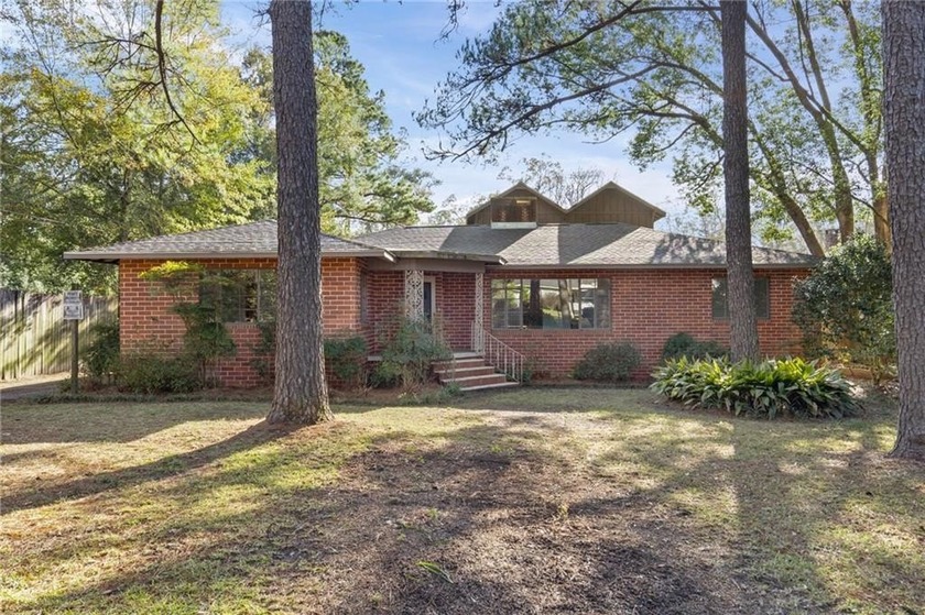 This large waterfront four bedroom, three bath brick home is - Beach Home for sale in Mobile, Alabama on Beachhouse.com