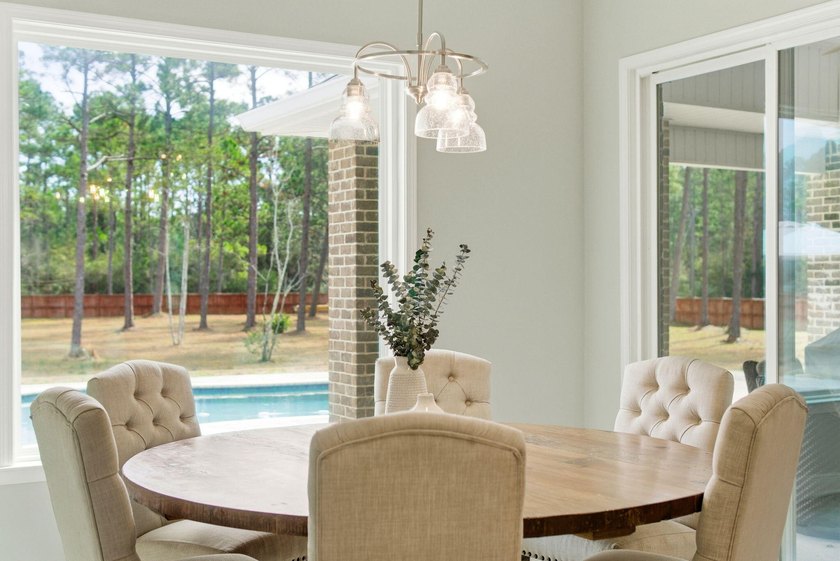 Welcome to a truly rare, one-of-a-kind 3+ ACRE DREAM HOME in - Beach Home for sale in Navarre, Florida on Beachhouse.com