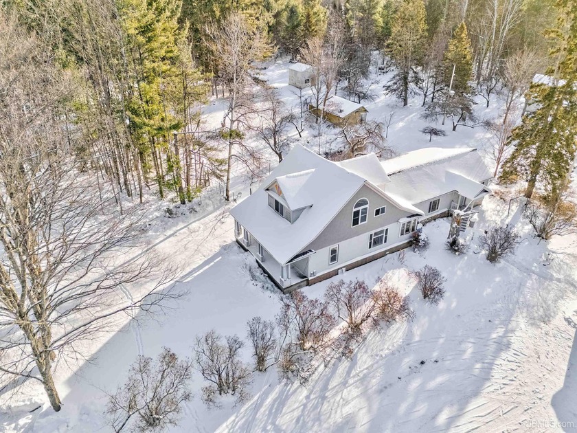 Step back in time with this turn-of-the-century Craftsman-style - Beach Home for sale in Manistique, Michigan on Beachhouse.com