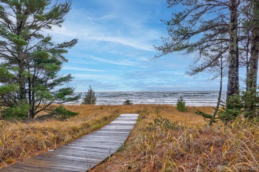 Experience an extraordinary level of privacy and refinement with - Beach Home for sale in Gulliver, Michigan on Beachhouse.com
