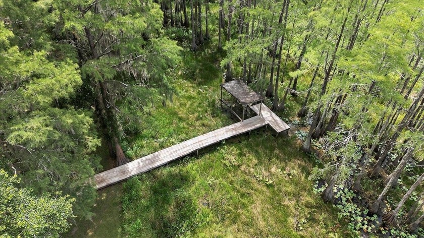 Must see! Updates made! New flooring and paint! Paradise awaits - Beach Home for sale in Tallahassee, Florida on Beachhouse.com