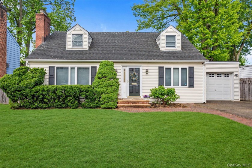 Welcome to 15 Purdue Road in Glen Cove. This charming Cape - Beach Home for sale in Glen Cove, New York on Beachhouse.com