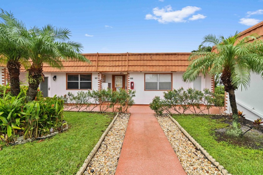 Begin your next chapter of life in Florida in the immaculately - Beach Home for sale in Delray Beach, Florida on Beachhouse.com