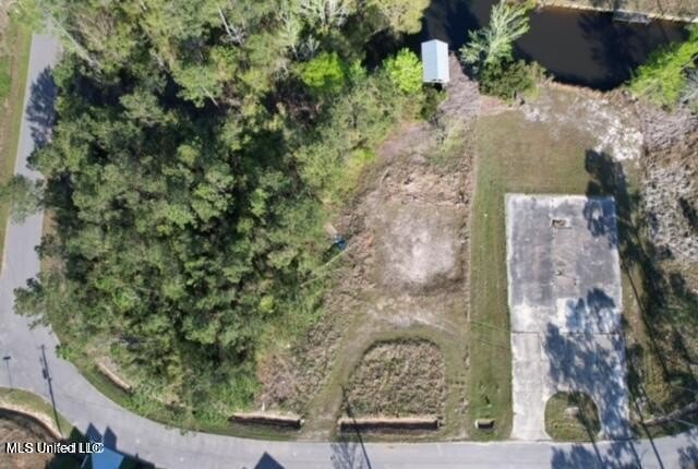 This beautiful waterfront lot has house pad in place, bulk head - Beach Lot for sale in Diamondhead, Mississippi on Beachhouse.com