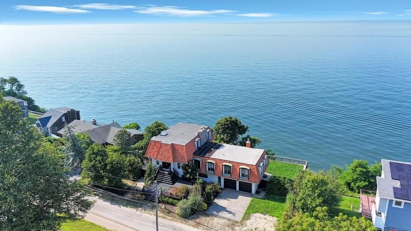 Welcome to this truly unique 3 story waterfront home offering - Beach Home for sale in Sound Beach, New York on Beachhouse.com