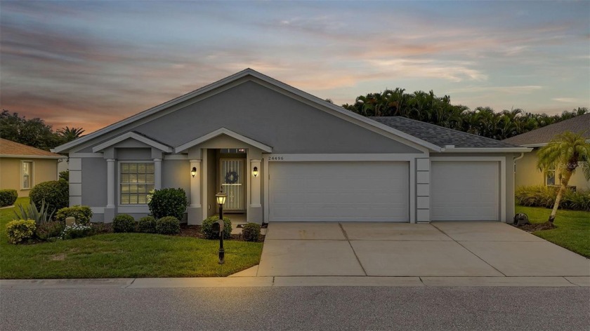 SENSATIONAL and RARELY AVAILABLE 3-CAR GARAGE home in the gated - Beach Home for sale in Punta Gorda, Florida on Beachhouse.com