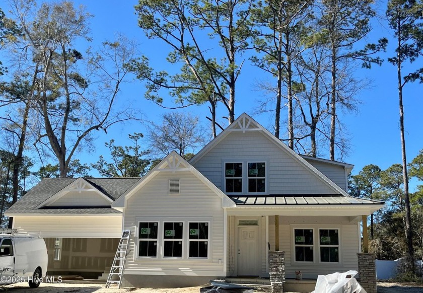 The Bennett offered by Logan Homes is perfectly nestled between - Beach Home for sale in Calabash, North Carolina on Beachhouse.com
