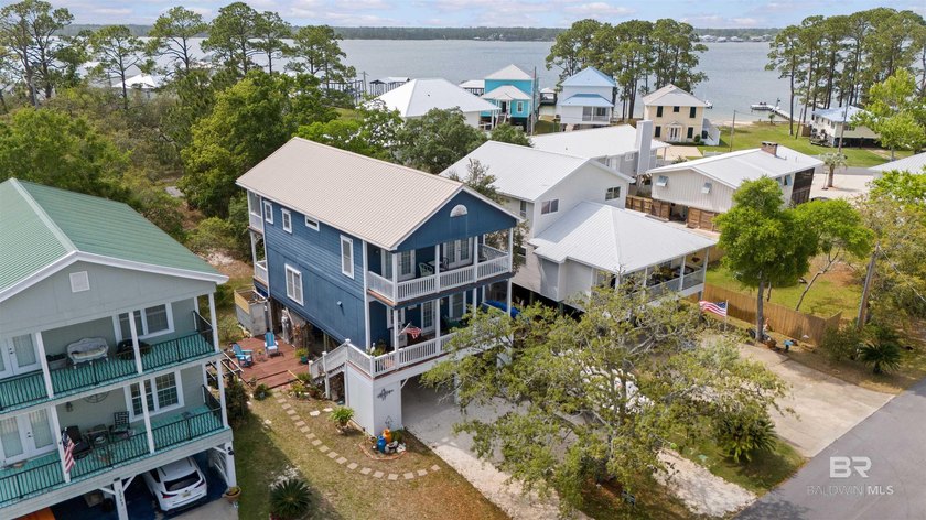This home is in the heart of the sought after golf cart - Beach Home for sale in Orange Beach, Alabama on Beachhouse.com