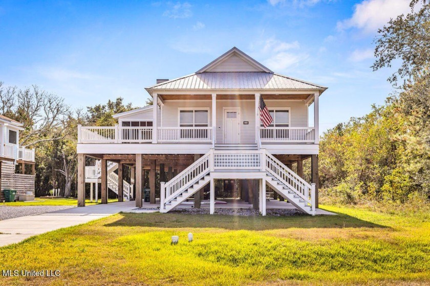 Built in 2023, this custom 3BR 2BA home is just a short walk - Beach Home for sale in Bay Saint Louis, Mississippi on Beachhouse.com