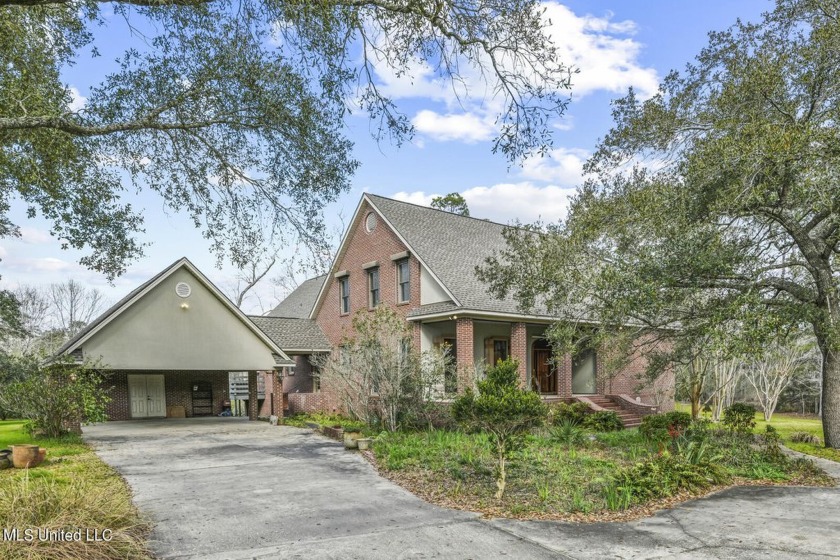 Welcome to your waterfront oasis nestled on 4.4 acres of serene - Beach Home for sale in Pass Christian, Mississippi on Beachhouse.com