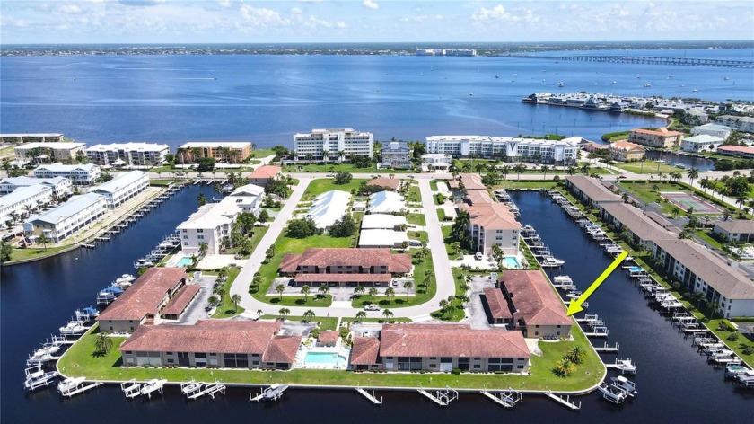 Welcome to this stunning 3-bedroom, 2.5-bath top-floor end-unit - Beach Condo for sale in Punta Gorda, Florida on Beachhouse.com