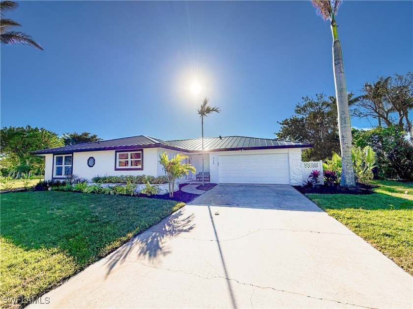 Immerse yourself in the ultimate island lifestyle with this - Beach Home for sale in Sanibel, Florida on Beachhouse.com