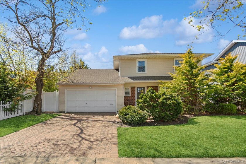 Welcome to this beautifully maintained Colonial nestled in the - Beach Home for sale in Lido Beach, New York on Beachhouse.com