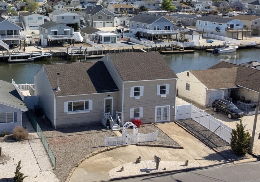 Welcome to your waterfront retreat! This spacious and - Beach Home for sale in Little Egg Harbor, New Jersey on Beachhouse.com