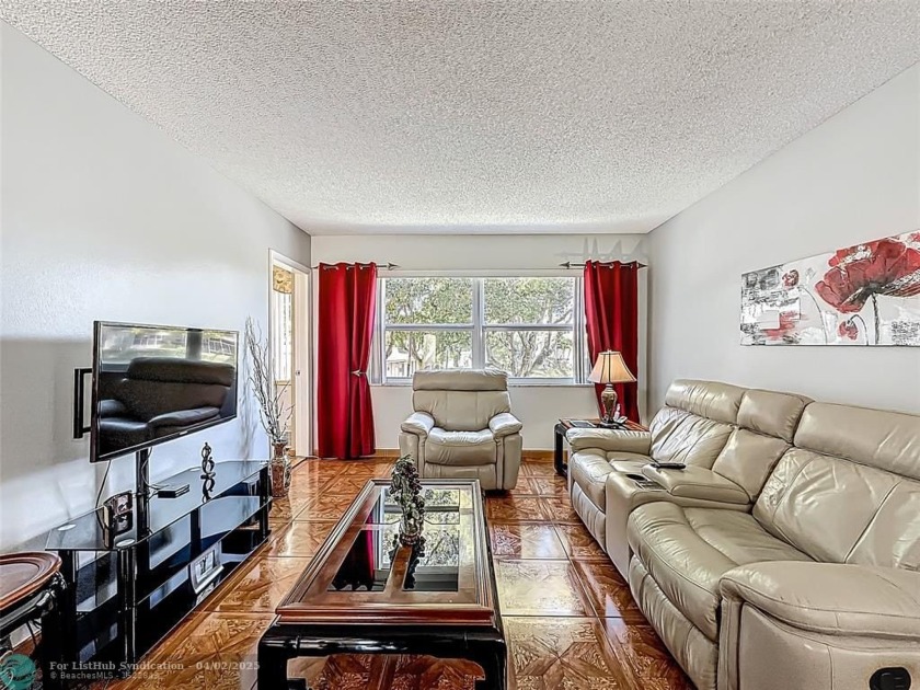 Located in an Opportunity Zone, this well-maintained unit - Beach Condo for sale in Lauderdale Lakes, Florida on Beachhouse.com