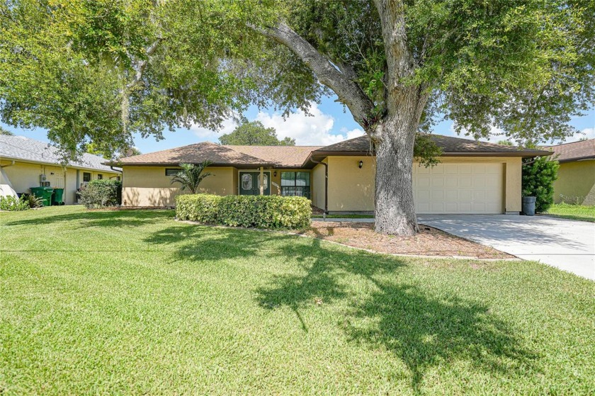 Welcome to this charming 4 bedroom, 2.5 bath home, lovingly - Beach Home for sale in Port Charlotte, Florida on Beachhouse.com