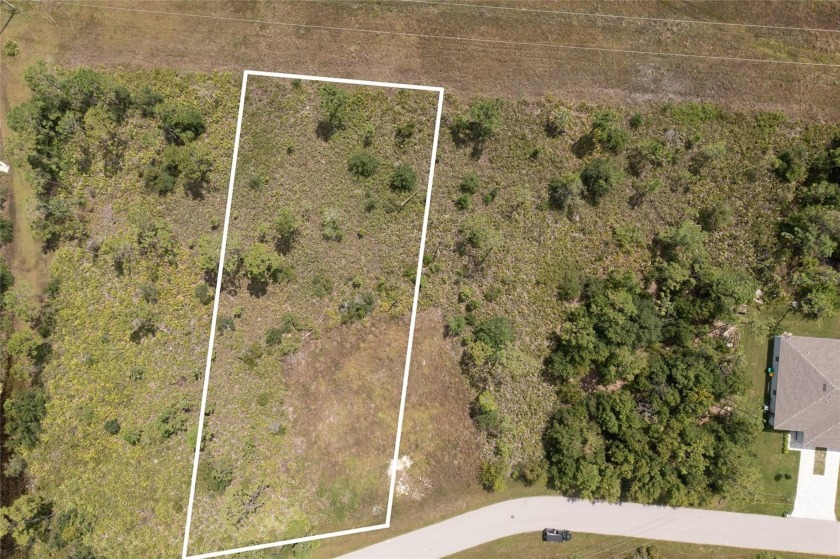 JUST OVER A 1/2 ACRE VACANT LOT IN SOUGHT AFTER DEEP CREEK - Beach Lot for sale in Punta Gorda, Florida on Beachhouse.com