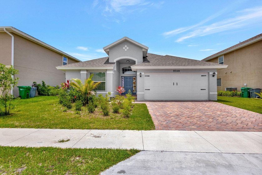 This charming 3-bedroom, 2-bath home offers a spacious open - Beach Home for sale in Fort Pierce, Florida on Beachhouse.com