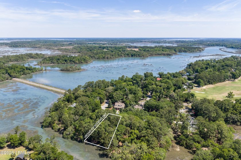 Tucked away on a quiet cul-de-sac, this beautiful wooded - Beach Lot for sale in Beaufort, South Carolina on Beachhouse.com