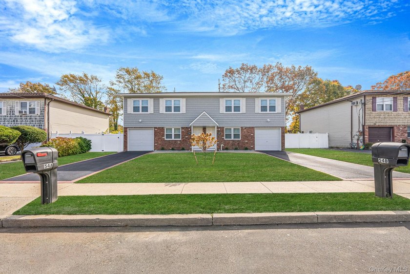 Rare opportunity to own a beautifully renovated legal 2-family - Beach Home for sale in West Babylon, New York on Beachhouse.com