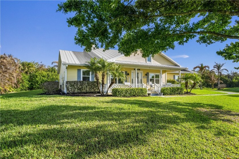 Fall in love with this sun-drenched, yellow farmhouse nestled on - Beach Home for sale in Vero Beach, Florida on Beachhouse.com