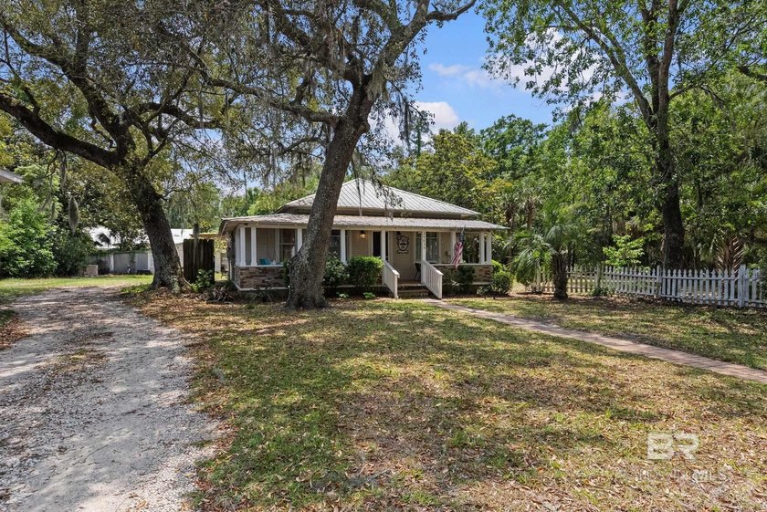 Charming 3-bedroom, 2-bath coastal cottage built in 1925 - Beach Home for sale in Orange Beach, Alabama on Beachhouse.com