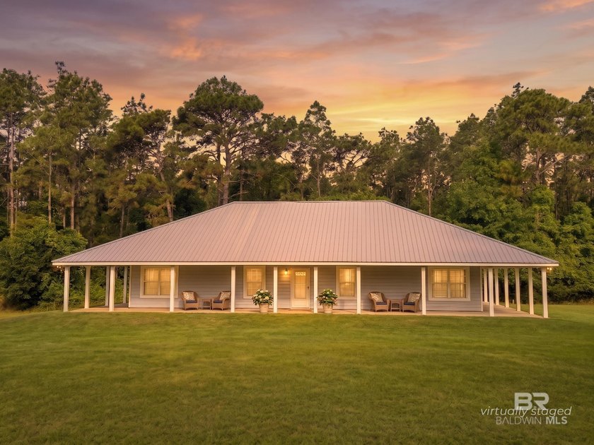 The drive into this 16.33+/- Acre Homestead sets the - Beach Home for sale in Robertsdale, Alabama on Beachhouse.com