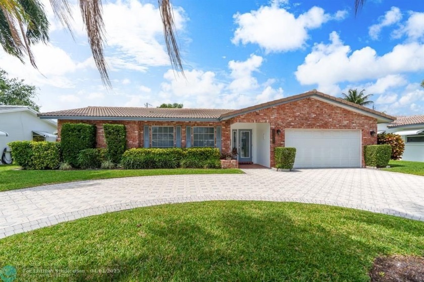 Paved circular driveway welcomes you to this bright and airy - Beach Home for sale in Pompano Beach, Florida on Beachhouse.com