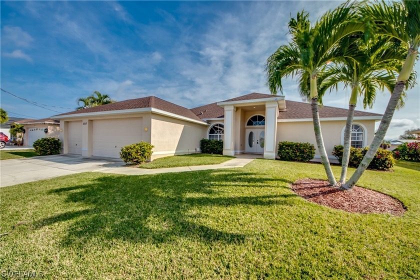 WATERFRONT 4 BEDROOM POOL HOME!! THIS GREAT HOME IS LOCATED ON - Beach Home for sale in Cape Coral, Florida on Beachhouse.com