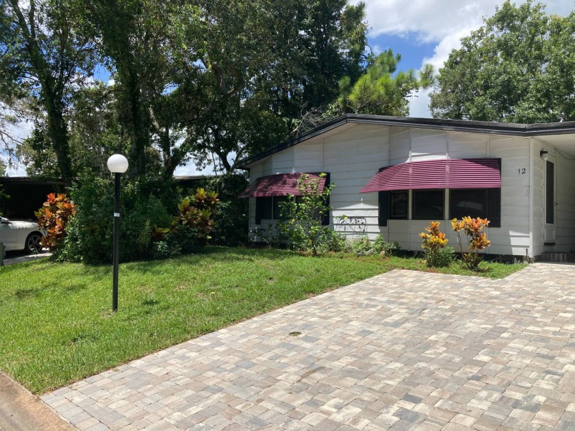 Centrally Located in The Falls, an upscale 55+ active community - Beach Home for sale in Ormond Beach, Florida on Beachhouse.com
