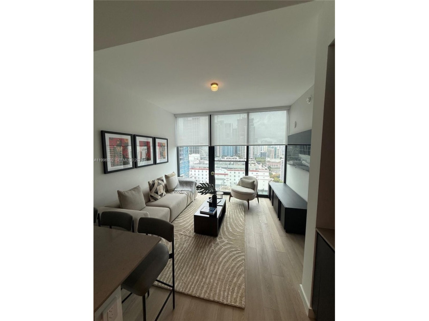 Experience elevated city living in this fully furnished, turnkey - Beach Condo for sale in Miami, Florida on Beachhouse.com