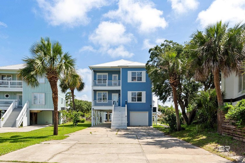 Welcome to 220 Sunrise Drive, a beautifully updated waterfront - Beach Home for sale in Gulf Shores, Alabama on Beachhouse.com