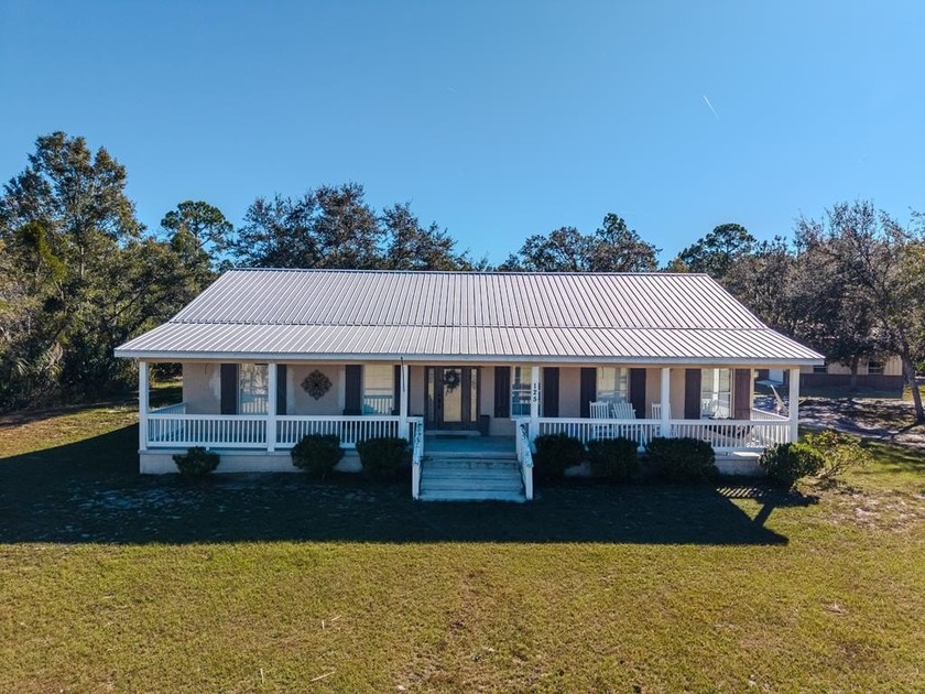 Discover peaceful country living just minutes from the coastal - Beach Home for sale in Horseshoe Beach, Florida on Beachhouse.com