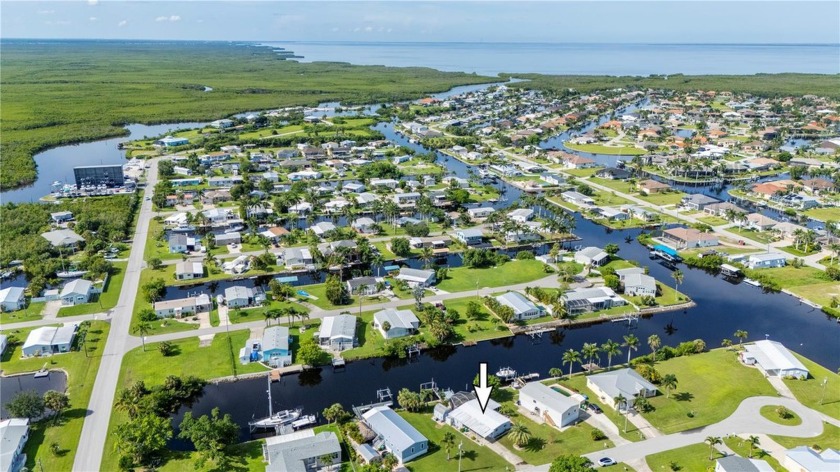 Sailboat Waterfront Pool Home, offering quick access to - Beach Home for sale in Punta Gorda, Florida on Beachhouse.com