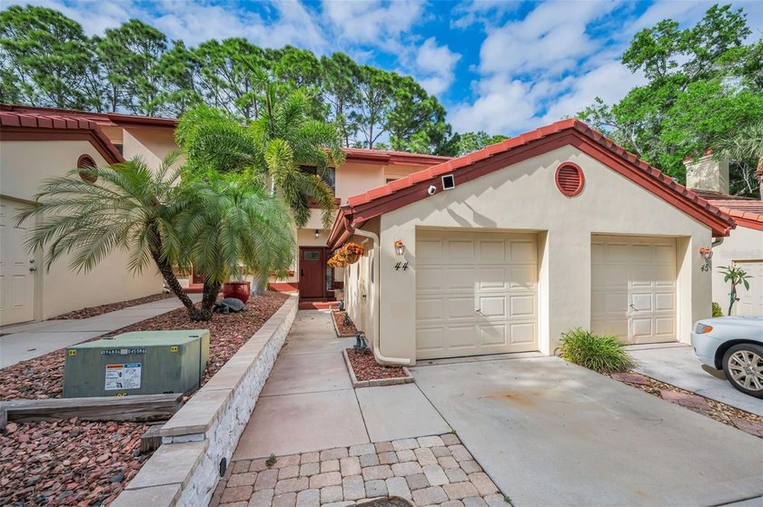 Welcome to Countryside Woods, located in the highly sought-after - Beach Townhome/Townhouse for sale in Clearwater, Florida on Beachhouse.com